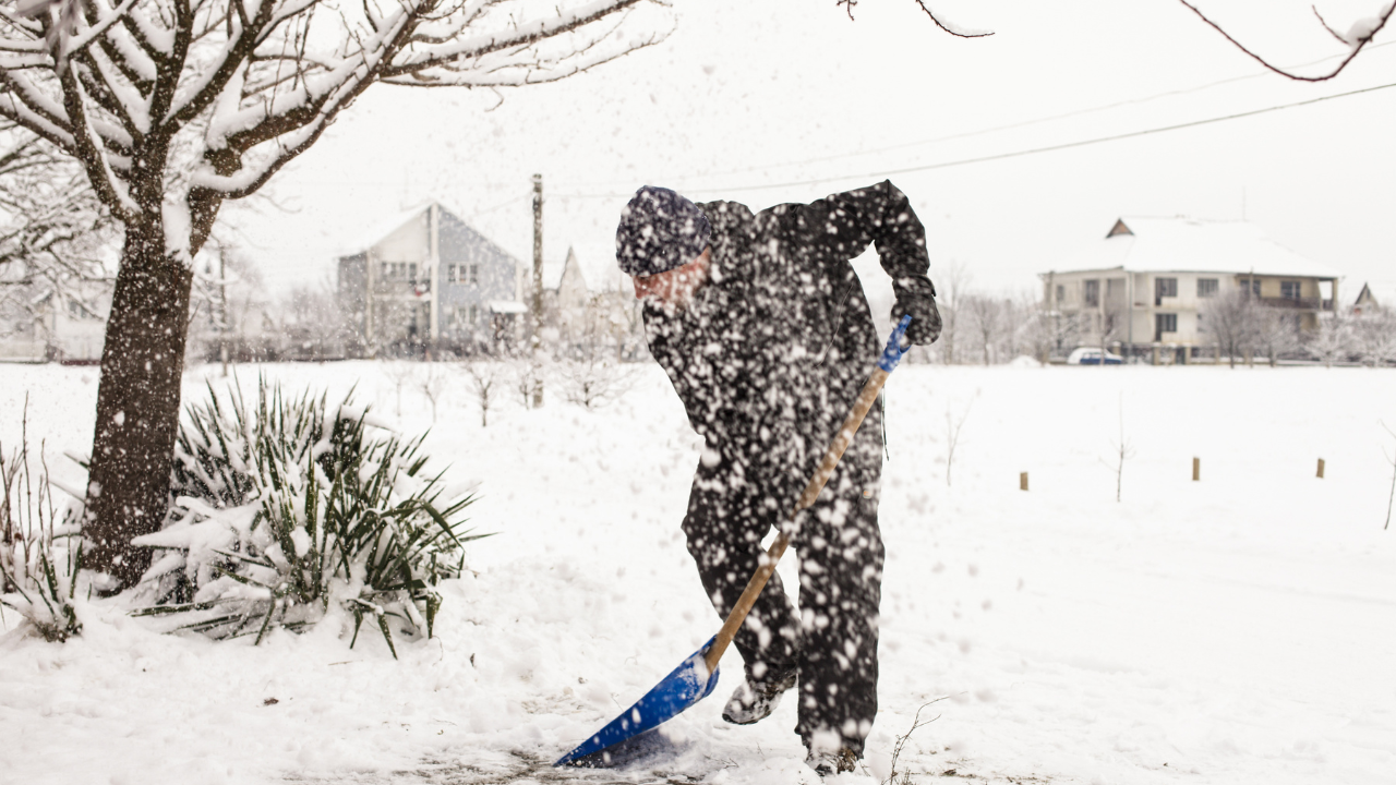 snow removal in a storm 
